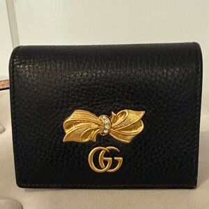 Gucci Black Leather Bifold Wallet with Gold Bow and GG Emblem